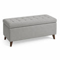 Panca contenitore in tessuto grigio con gambe in legno